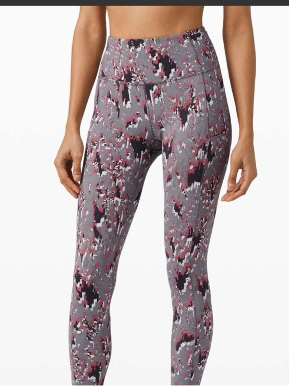 Lululemon Fast and Free High Rise Tights in the "Floral Flux Multi" pattern.